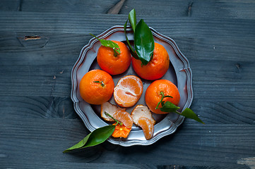 Image showing Mandarin orange fruit typical of winter