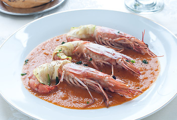 Image showing Prawns wrapped in zucchini with bisque sauce