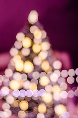 Image showing Decorated Christmas tree. Blurred lights background