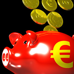 Image showing Coins Entering Piggybank Shows European Deposits