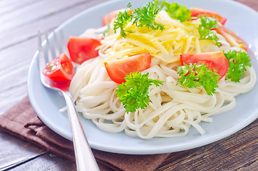 Image showing pasta with cheese and tomato