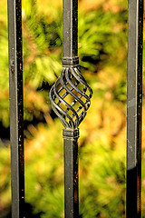 Image showing fence with green background