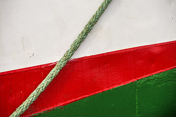 Image showing ship hull with pretty colors and mooring line