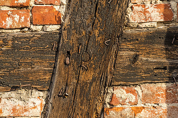 Image showing brick wall of an old frame house