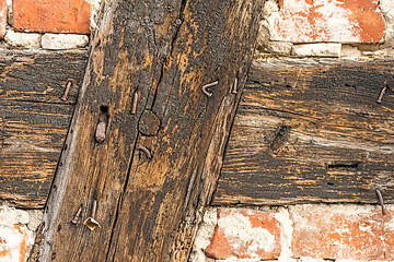 Image showing brick wall of an old frame house