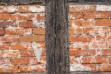 Image showing brick wall of an old frame house