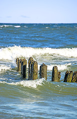 Image showing Baltic Sea with groynes and surf