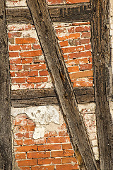 Image showing brick wall of an old frame house