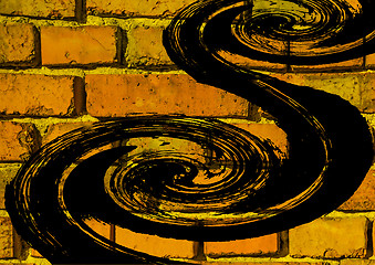 Image showing black spiral on brick wall