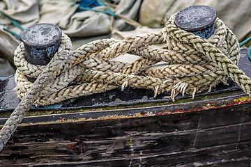 Image showing Cleat with mooring line of a trawler