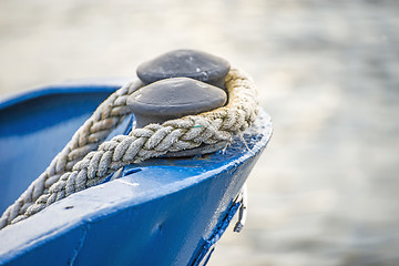 Image showing Ship bow with mooring lines in an harbor