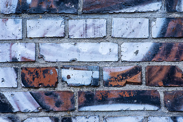 Image showing  old brick wall with graffitti