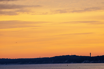 Image showing Sunrise over the Baltic Sea with groynes