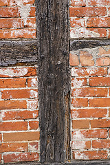 Image showing brick wall of an old frame house