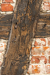 Image showing brick wall of an old frame house
