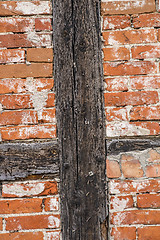 Image showing brick wall of an old frame house