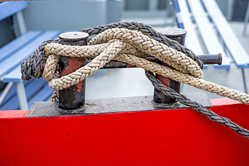 Image showing Cleat with mooring line of a boat