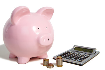 Image showing Pig bank and calculator