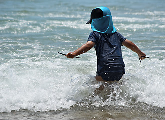 Image showing boy in waves