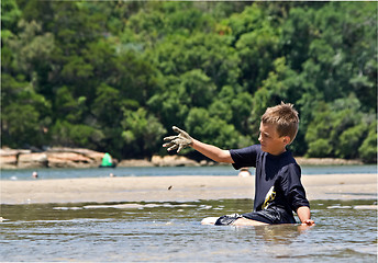 Image showing handful of mud