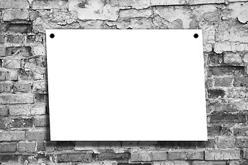 Image showing Sheet of a paper on a wall