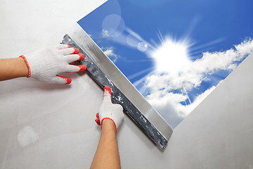 Image showing Contractor Plasterer.  Sun and sky