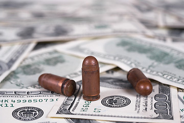 Image showing Dollars and cartridge