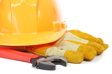 Image showing Helmet, spanner and coarse leather gloves