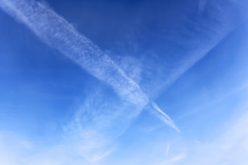 Image showing Aircraft crossed tracks in a blue sky