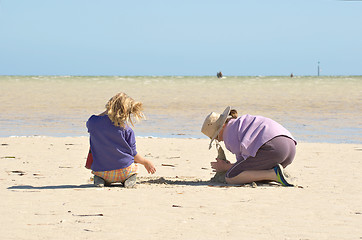 Image showing kids building sandcastles series no 1