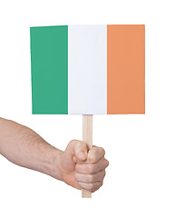 Image showing Hand holding small card - Flag of Ireland