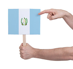 Image showing Hand holding small card - Flag of Guatemala