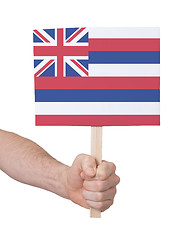 Image showing Hand holding small card - Flag of Hawaii