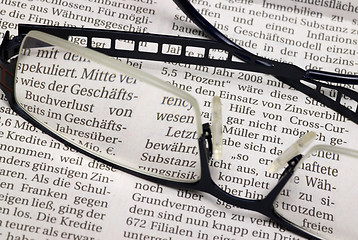 Image showing glasses and newspaper