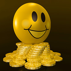 Image showing Smiley Face With Coins Shows Profitable Earnings