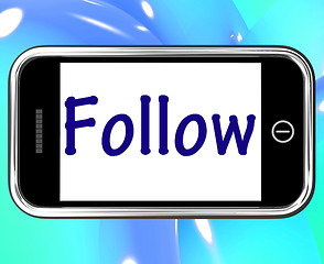 Image showing Follow Smartphone Means Following On Social Media For Updates