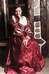 Image showing Pretty woman in red dress in retro baroque style