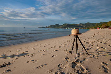 Image showing Beach on tropical island. Clear blue water, sand, clouds. 