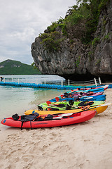 Image showing Colorful kayaks on beach in Thailand