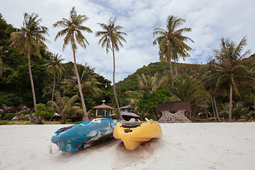 Image showing Colorful kayaks on beach in Thailand