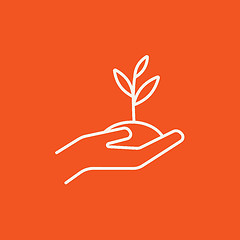 Image showing Hands holding seedling in soil line icon.