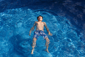 Image showing Boy swimm in pool