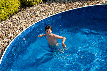 Image showing Boy swimm in pool