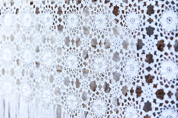 Image showing white woven lace patterned tablecloth