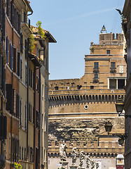 Image showing Castle of the Holy Angel through buildings