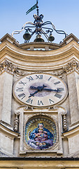 Image showing Old clock and a holy mosaic