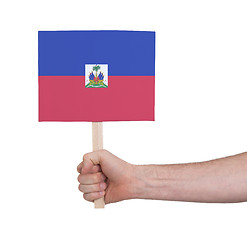 Image showing Hand holding small card - Flag of Haiti