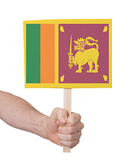 Image showing Hand holding small card - Flag of Sri Lanka