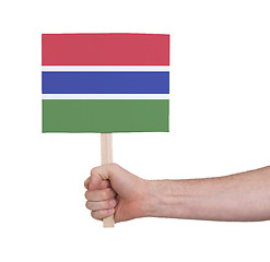 Image showing Hand holding small card - Flag of Gambia