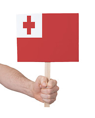 Image showing Hand holding small card - Flag of Tonga